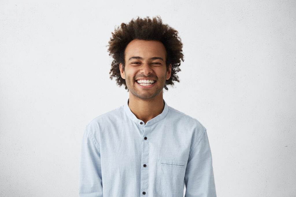 Cosmetic Dentistry Bayswater - young man in shirt smiling