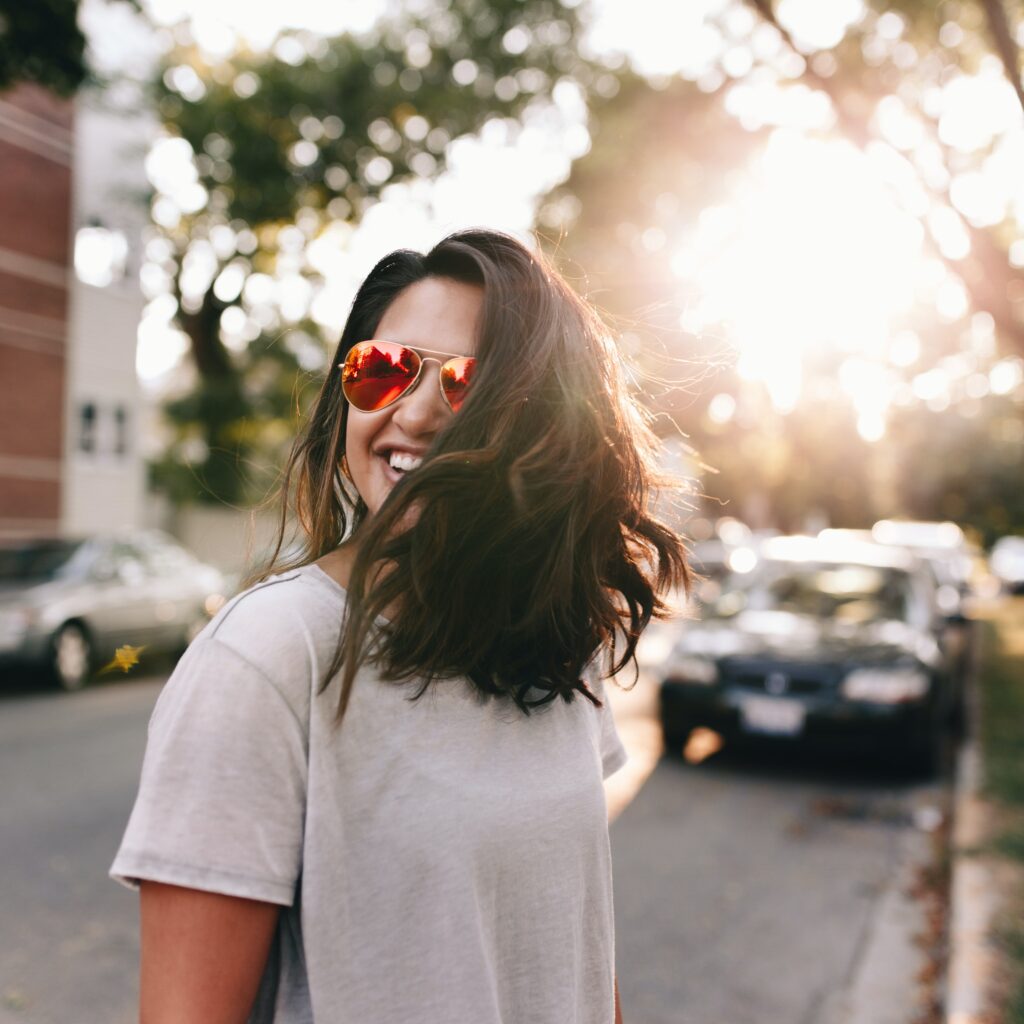 dental fillings Bayswater - Woman in sunglasses smiling